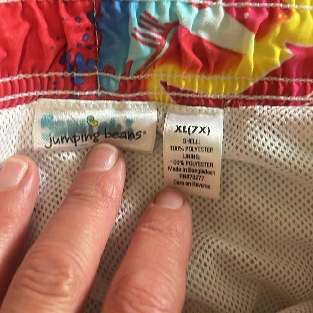 Jumping beans swim shorts.  Drawstring. Sharks. Size 7X